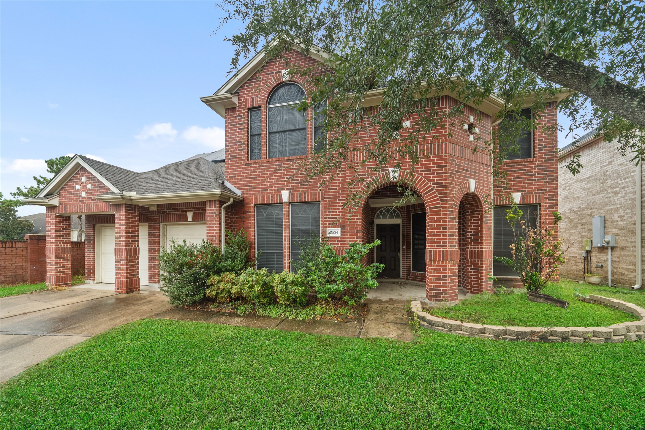 11534 Alpena Lane Houston, TX 77095 - Photo 25 of 28 front view of a house with a yard