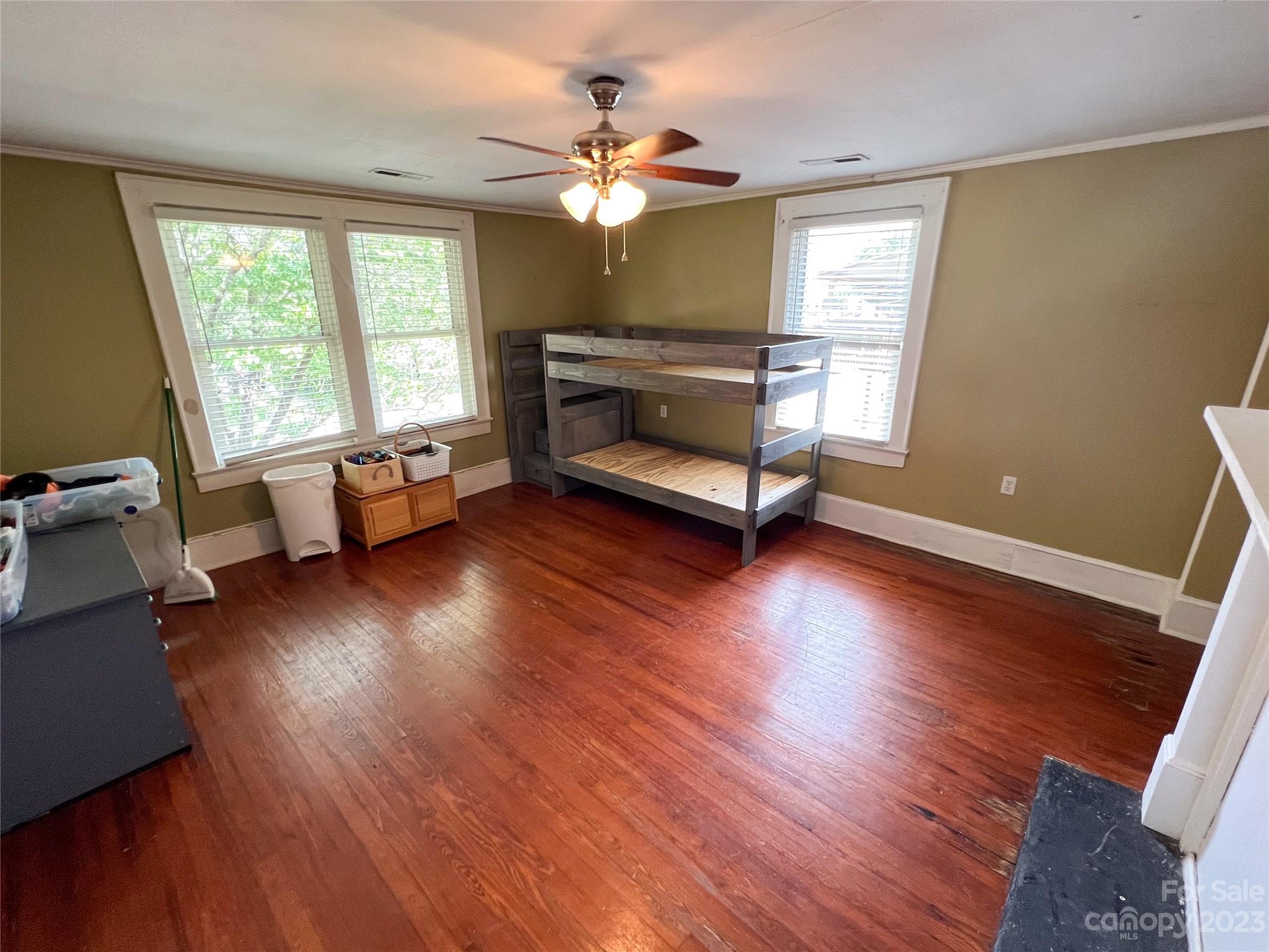 505 North Main Street Lenoir, NC 28645 - Photo 14 of 22 a living room with furniture and a chandelier