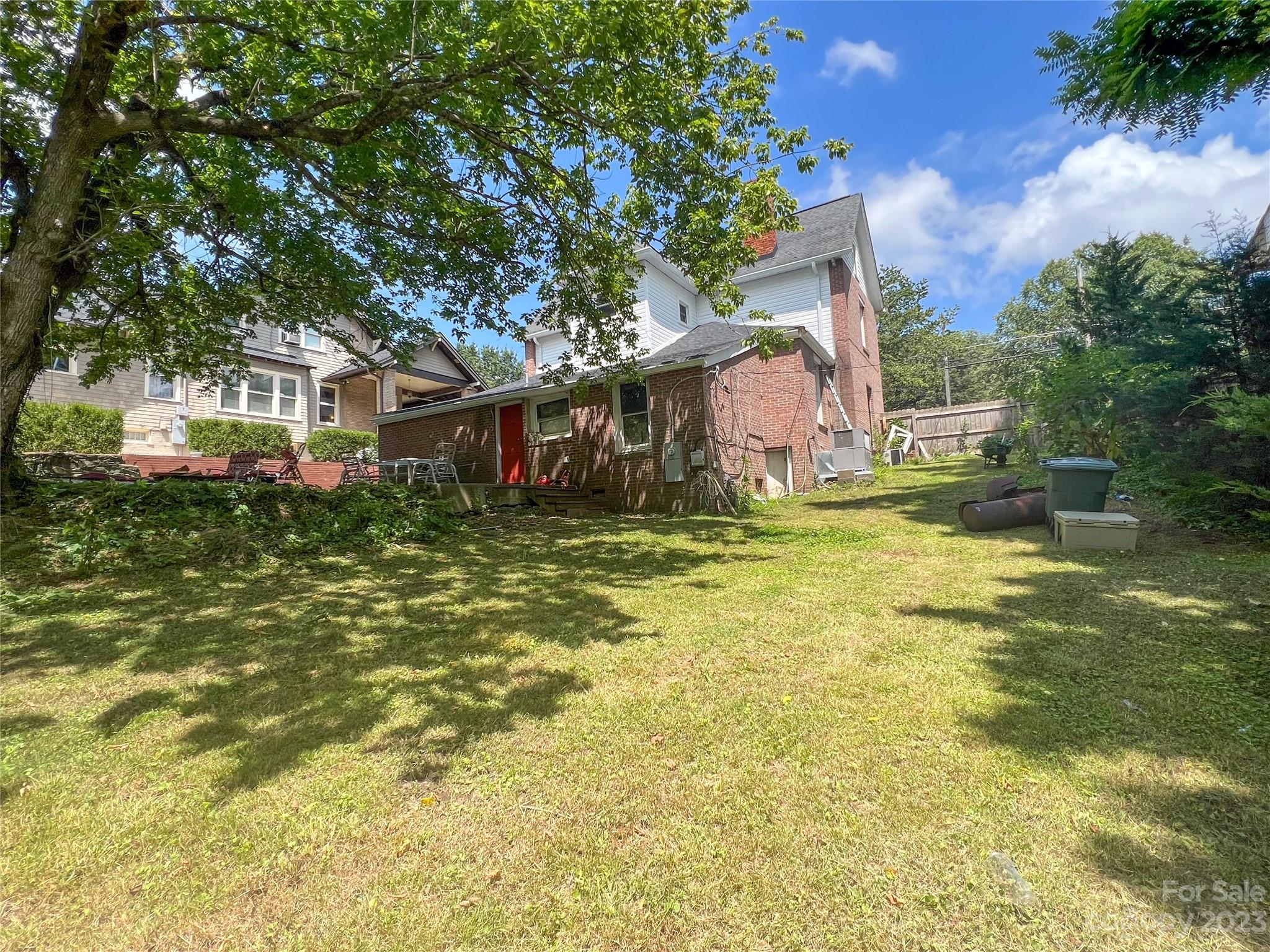505 North Main Street Lenoir, NC 28645 - Photo 18 of 22 a view of a house with a yard