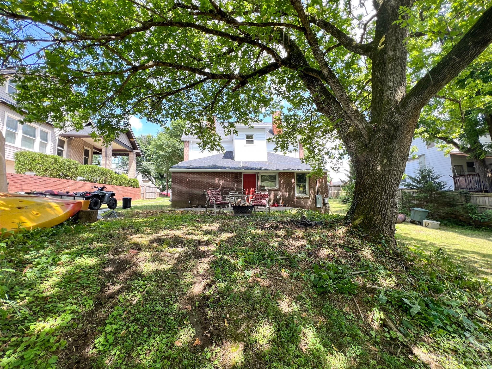 505 North Main Street Lenoir, NC 28645 - Photo 19 of 22 a front view of a house with a garden