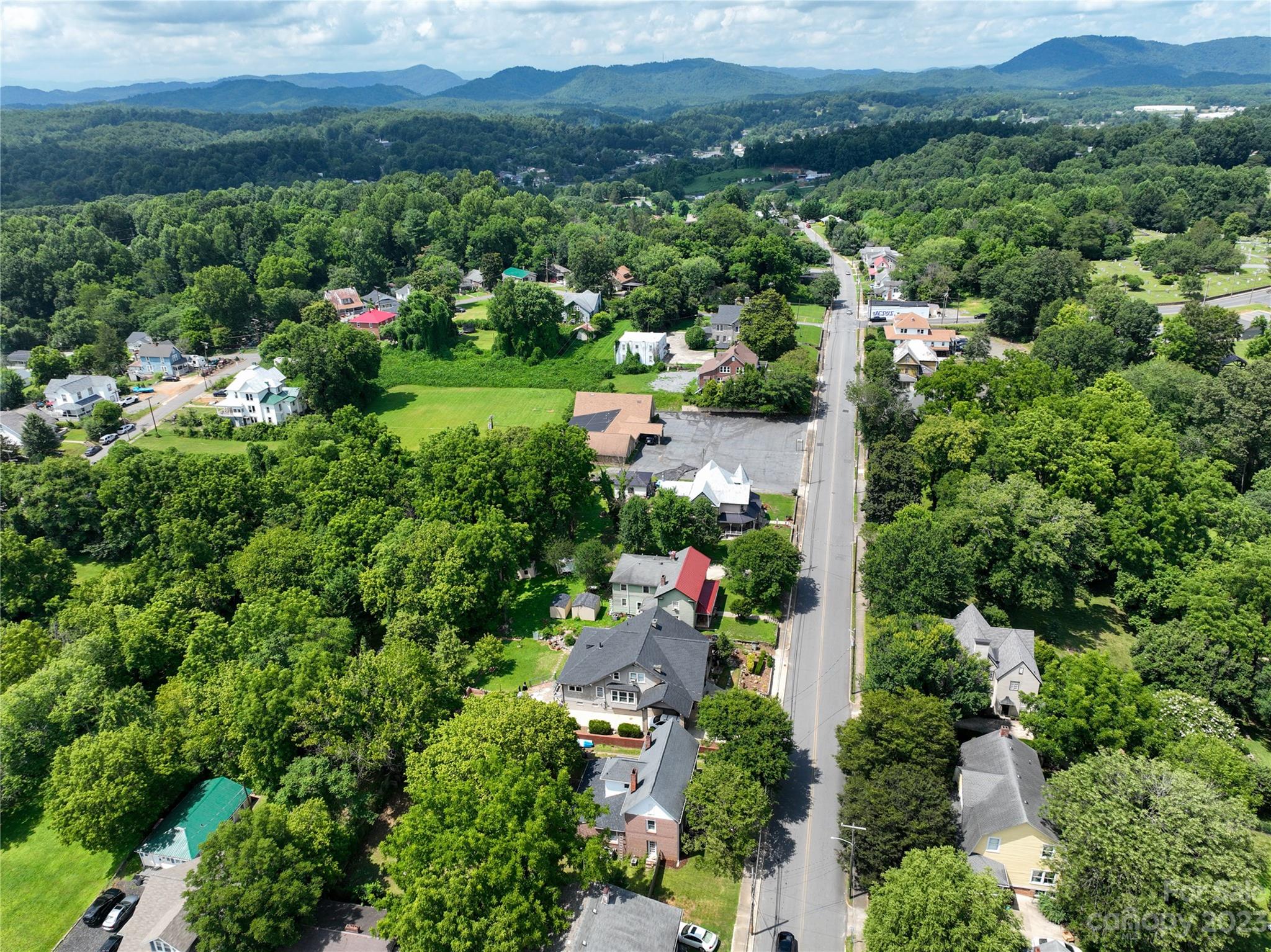 505 North Main Street Lenoir, NC 28645 - Photo 22 of 22 an aerial view of a house with mountain view