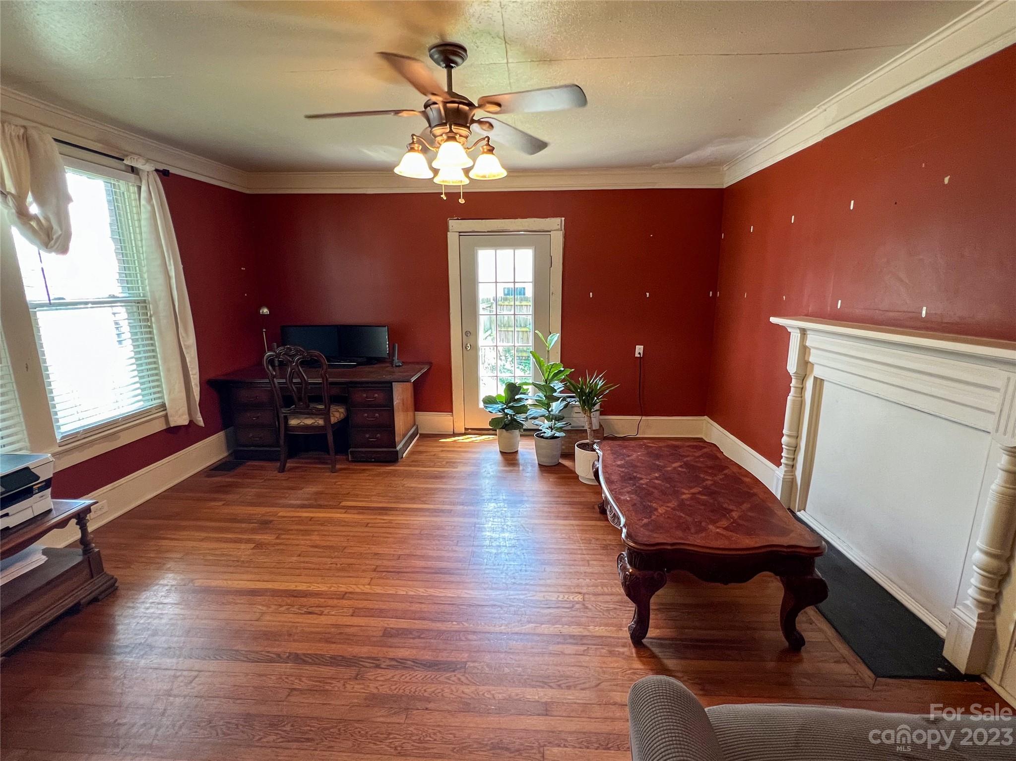 505 North Main Street Lenoir, NC 28645 - Photo 5 of 22 a living room with furniture and a chandelier