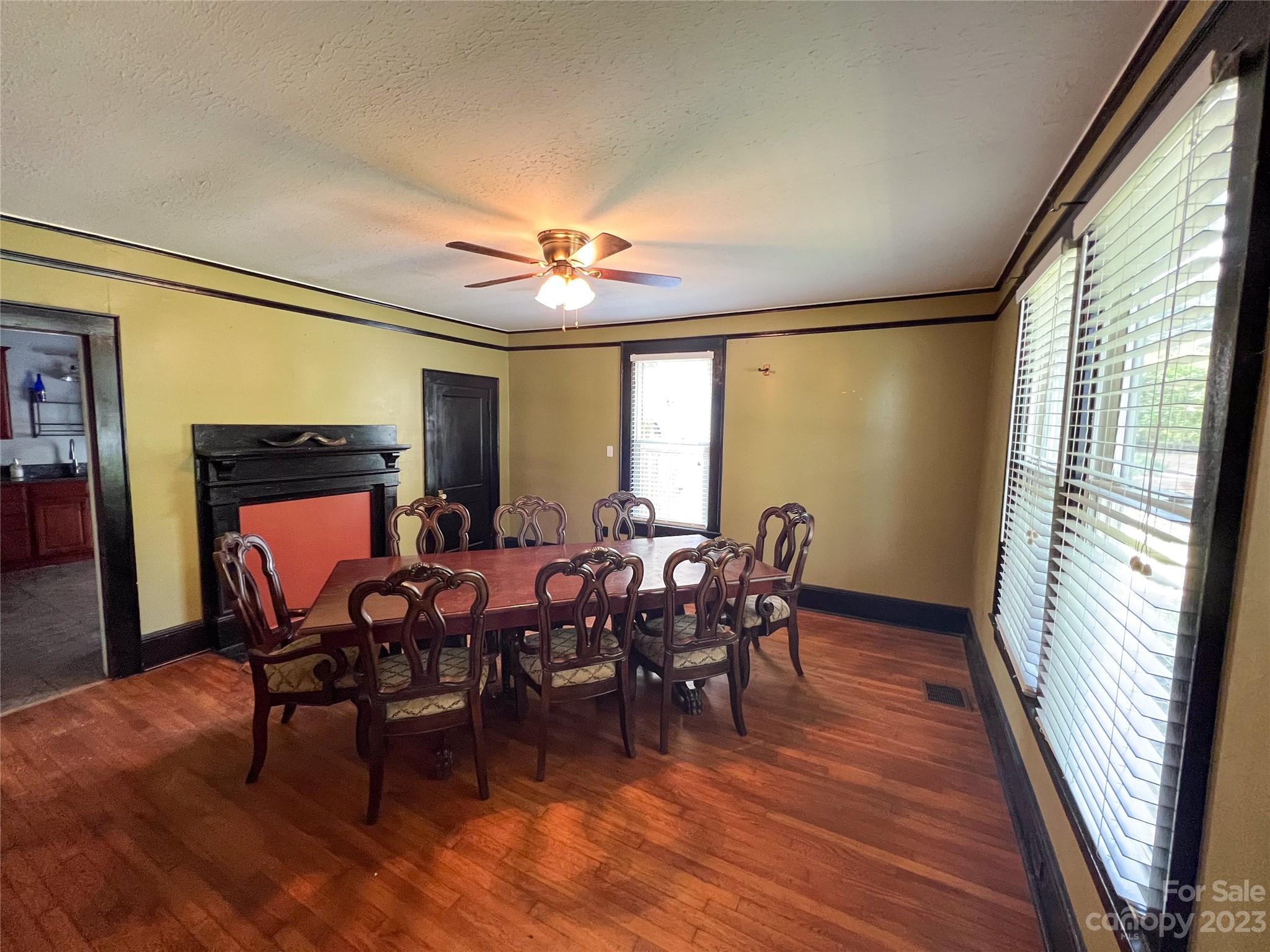 505 North Main Street Lenoir, NC 28645 - Photo 6 of 22 a view of a dining room with furniture window and wooden floor
