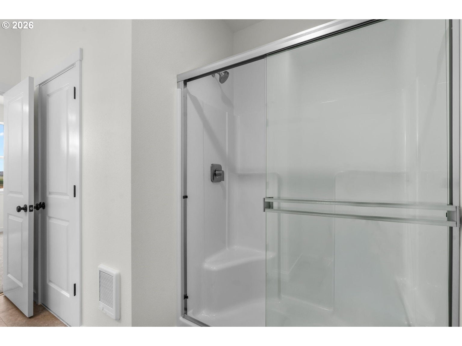 508 Southwest 6th Street Madras, OR 97741 - Photo 14 of 21 a bathroom with a shower and a glass door