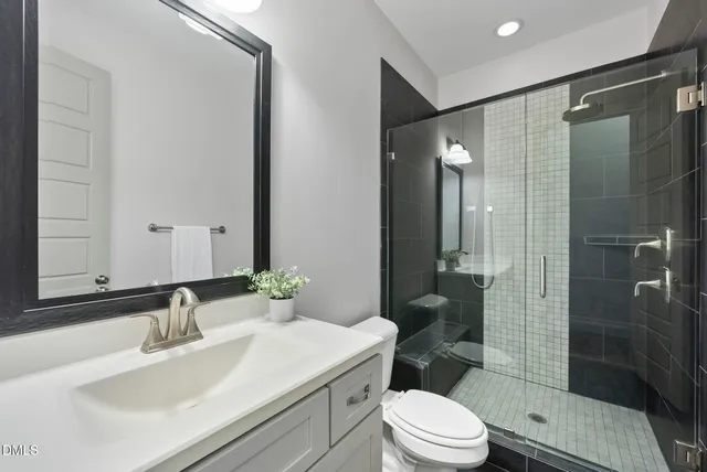 a living room with a couch and a large window