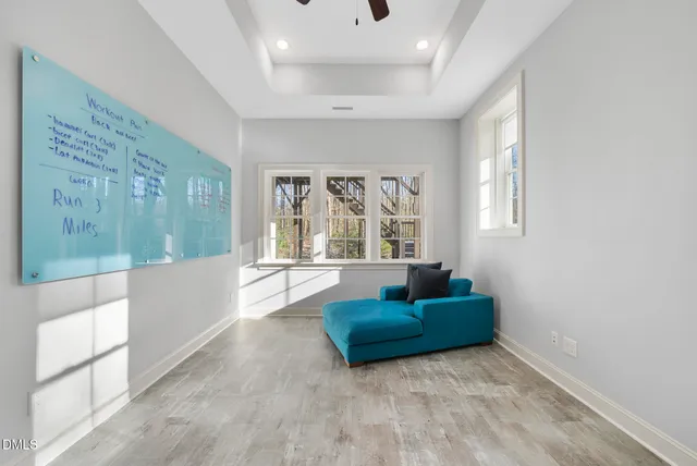 a view of backyard with wheel chair and palm tree