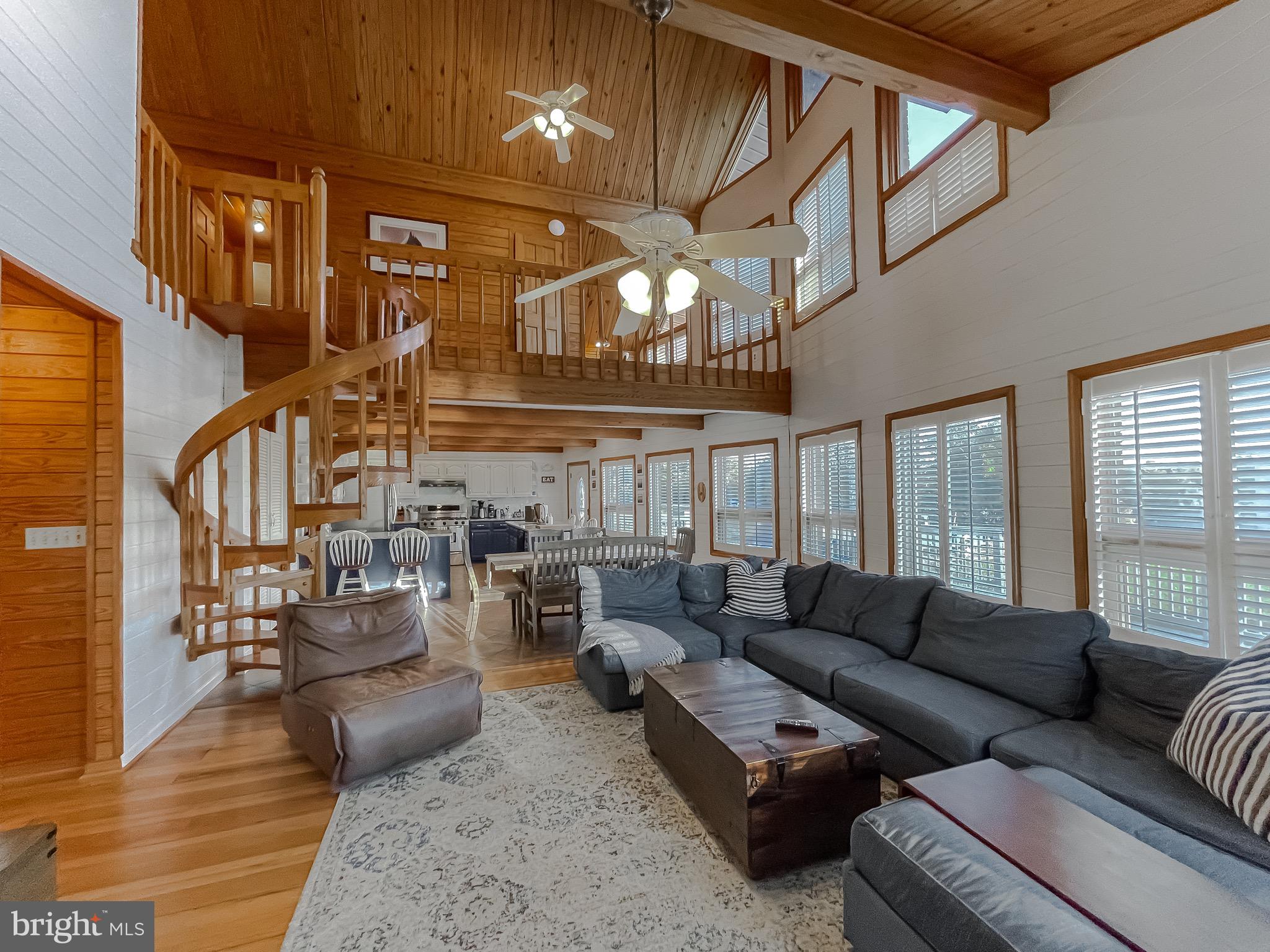 50166 Dove Cove Road Dameron, MD 20628 - Photo 7 of 103 Family room with two story beamed ceilings