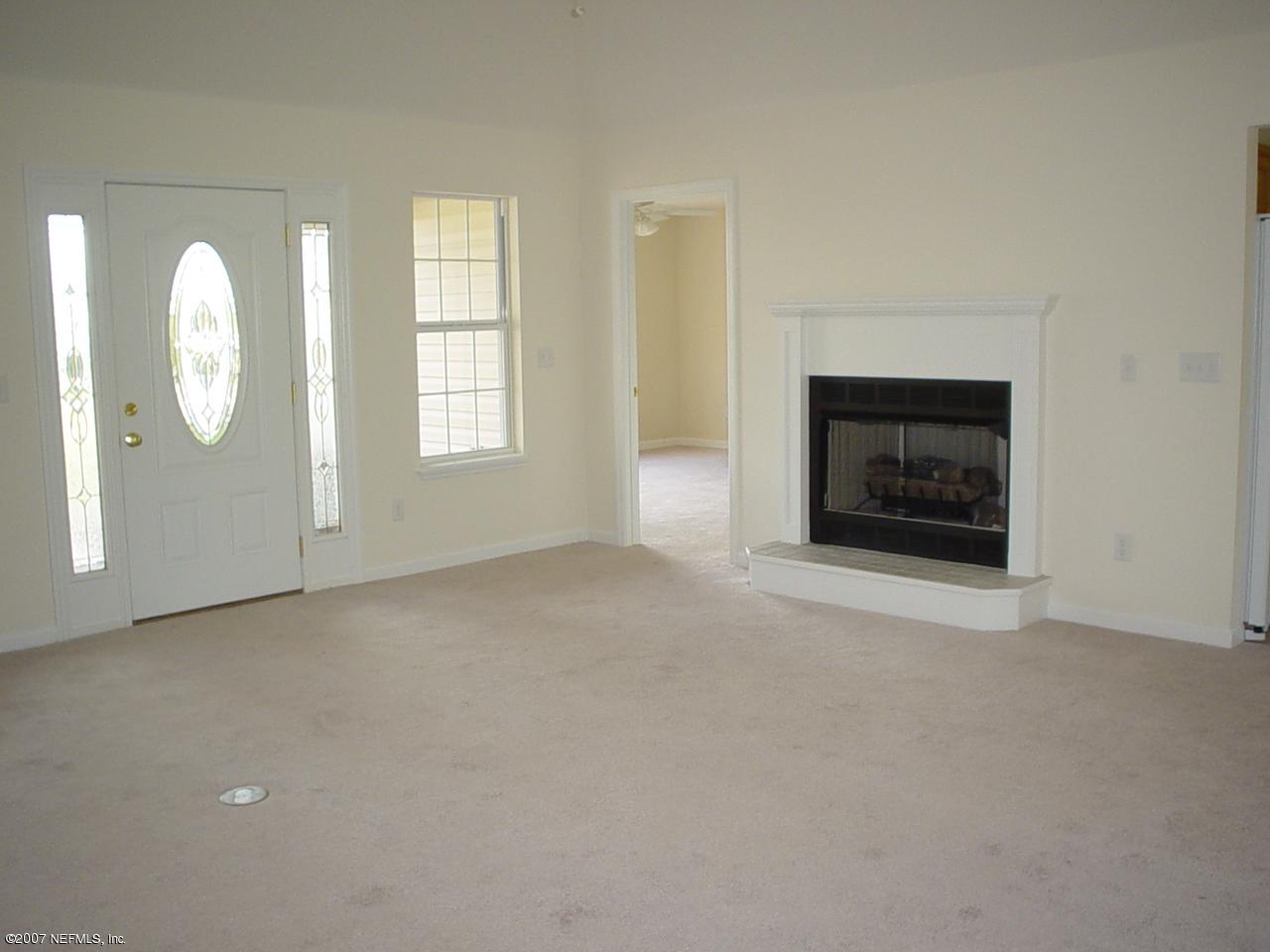 6465 Bob Kirkland Road Macclenny, FL 32063 - Photo 4 of 7 living room with fireplace