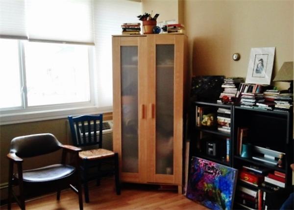 516 Green Street, Unit 1D Cambridge, MA 02139 - Photo 8 of 13 a kitchen with stainless steel appliances granite countertop a refrigerator and a dining table