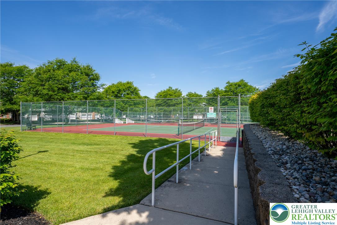 4345 Creek Road Allentown, PA 18104 - Photo 33 of 33 An inviting pathway leads to well-maintained community tennis courts, perfect for recreation.