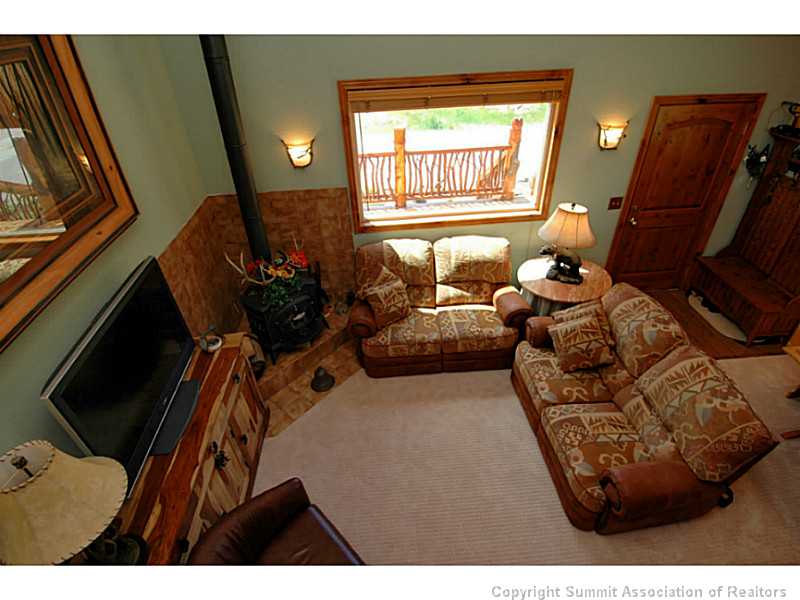 19 West Hansen Road Keystone, CO 80435 - Photo 3 of 25 Living Room. The living room is cozy and well lit.