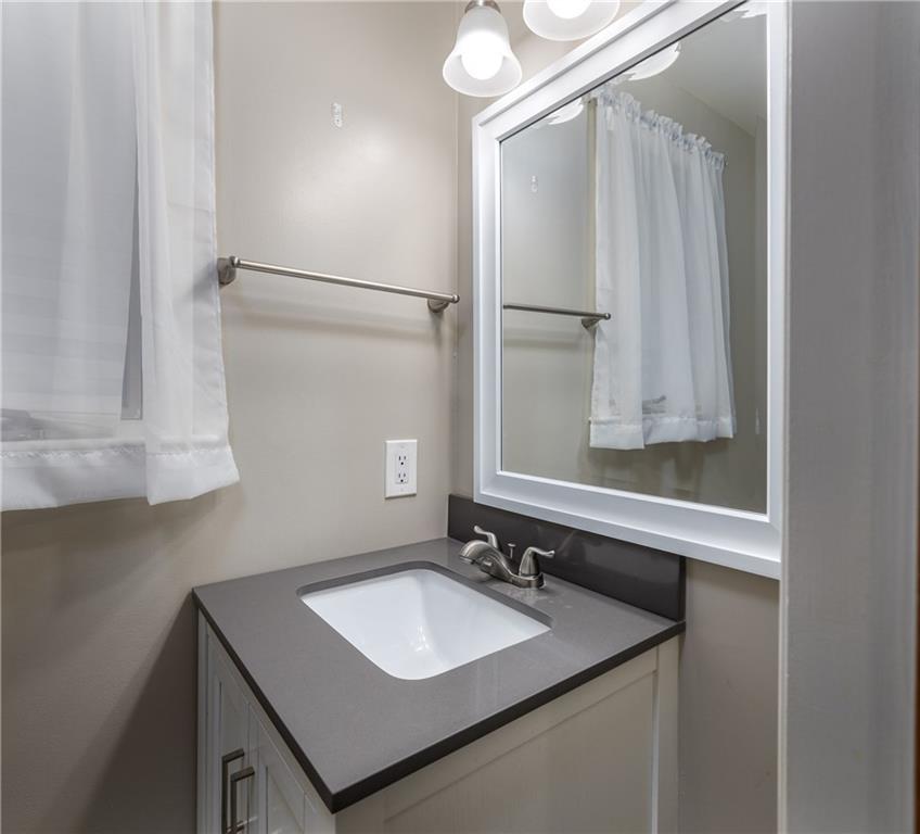 1512 Bower Hill Road Pittsburgh, PA 15243 - Photo 14 of 25 a bathroom with a sink and a mirror
