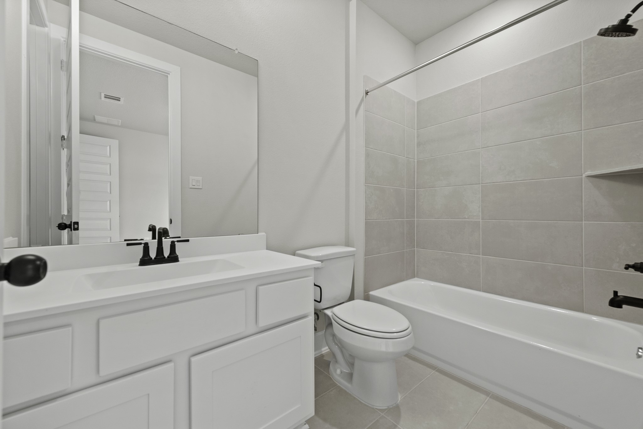 710 Walnut Br Drive Rosenberg, TX 77471 - Photo 12 of 24 a bathroom with a sink a toilet and shower