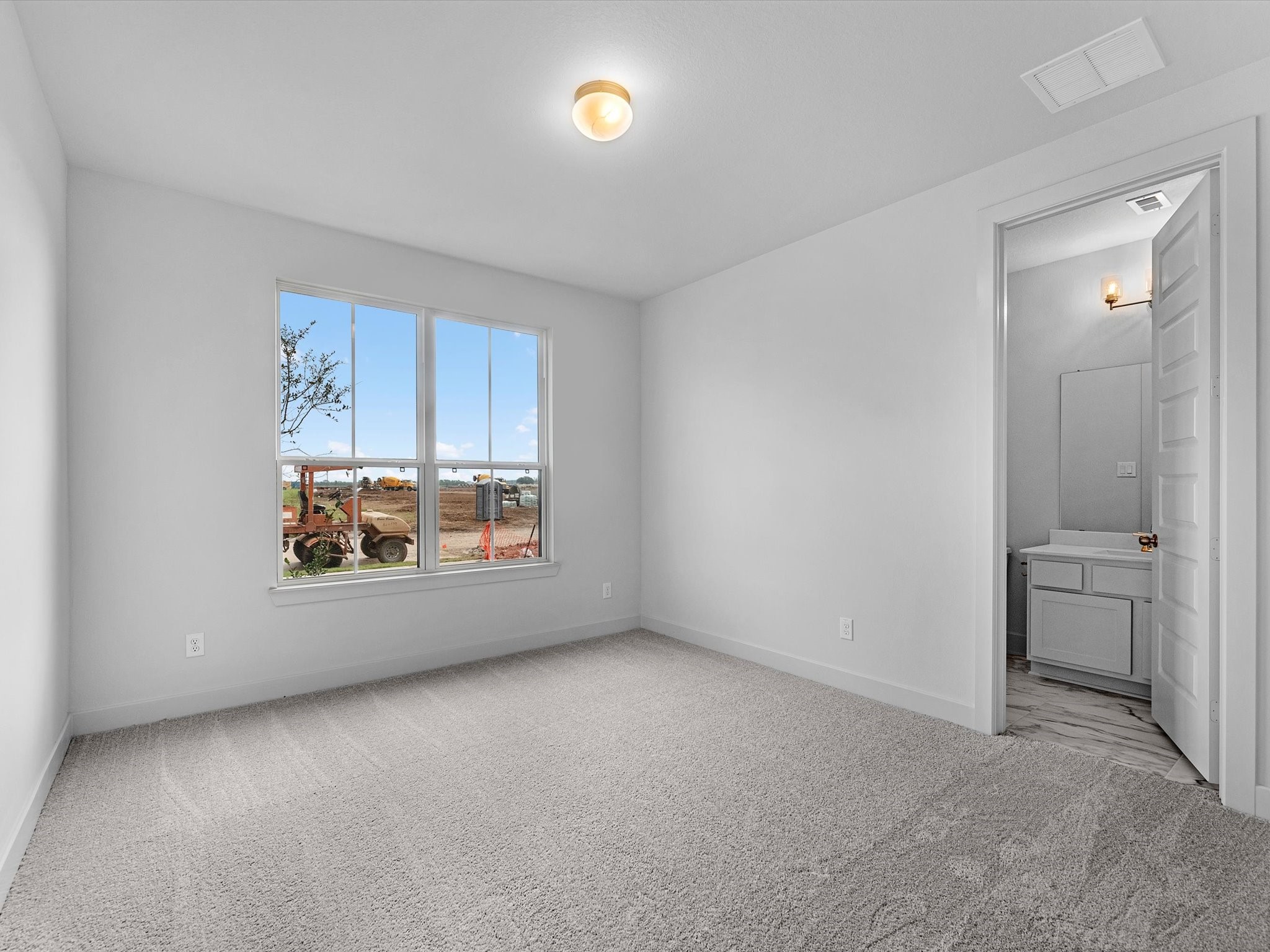 710 Walnut Br Drive Rosenberg, TX 77471 - Photo 14 of 25 an empty room with a window and a sink