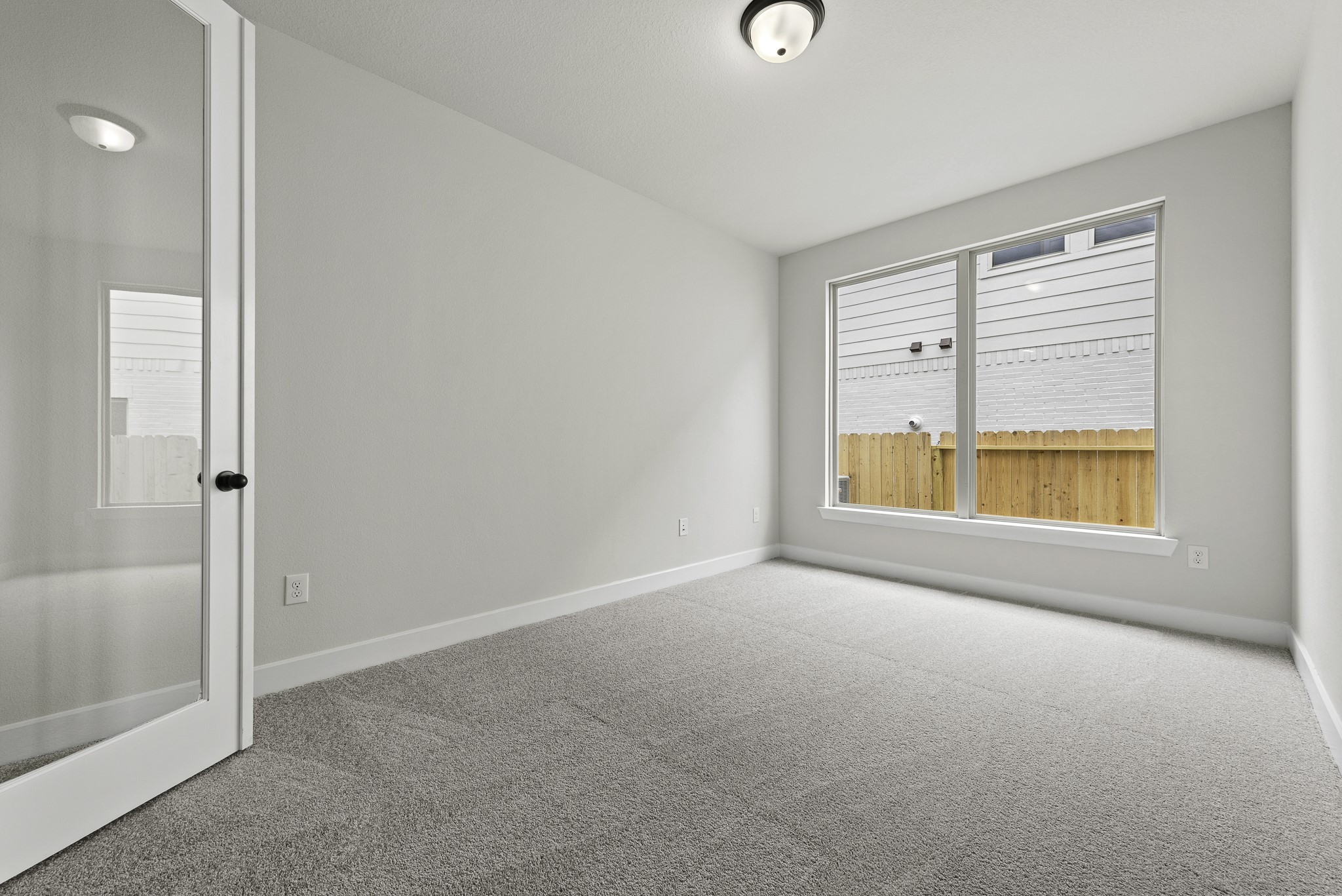 710 Walnut Br Drive Rosenberg, TX 77471 - Photo 14 of 24 a view of an empty room with a window
