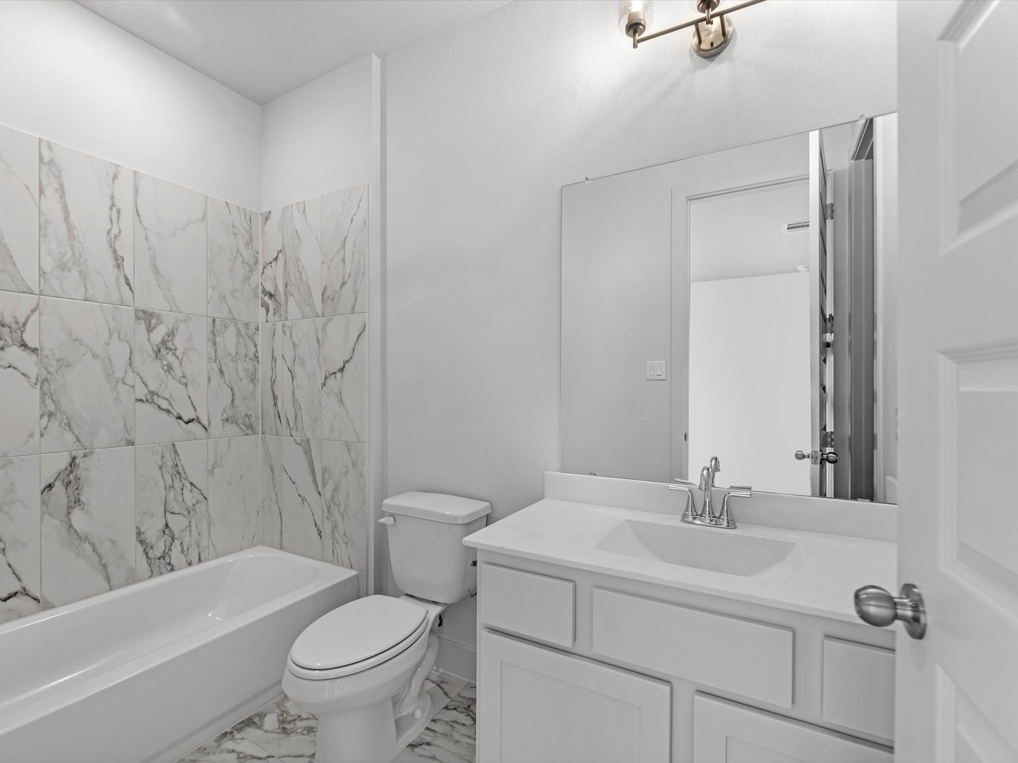 710 Walnut Br Drive Rosenberg, TX 77471 - Photo 15 of 25 a bathroom with a sink toilet and shower