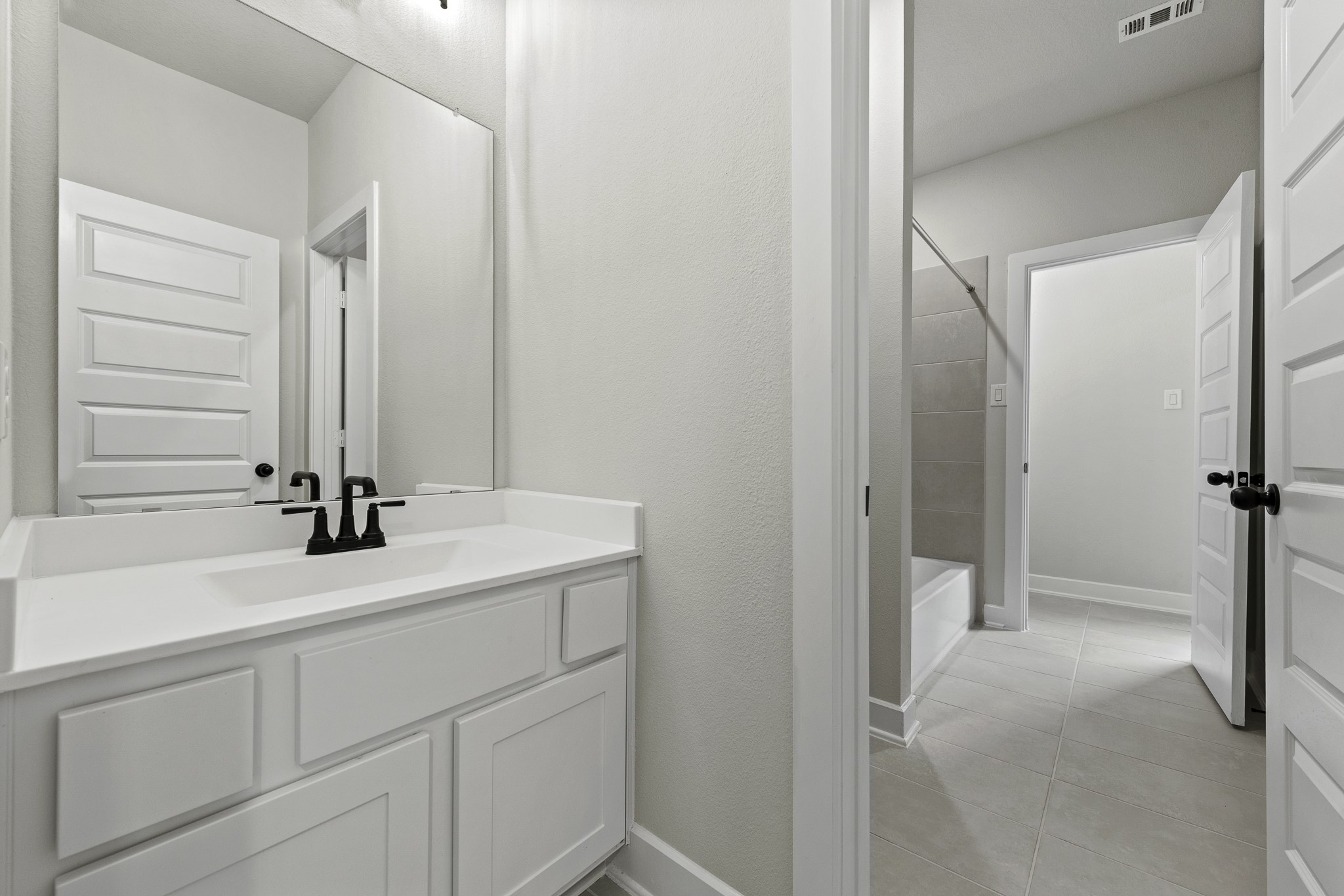 710 Walnut Br Drive Rosenberg, TX 77471 - Photo 18 of 24 a bathroom with a sink and a mirror