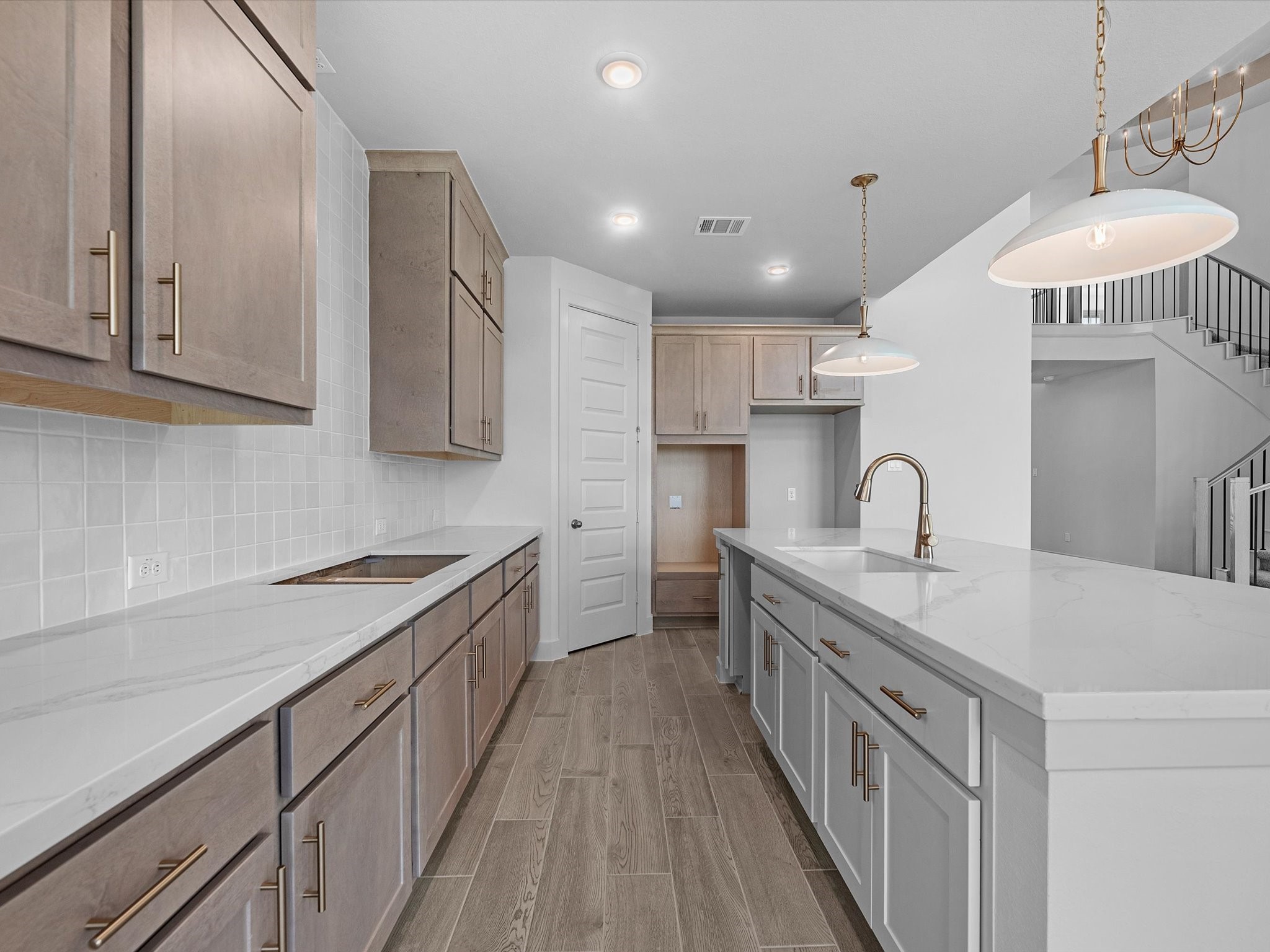 710 Walnut Br Drive Rosenberg, TX 77471 - Photo 8 of 25 a kitchen with a sink stove and cabinets