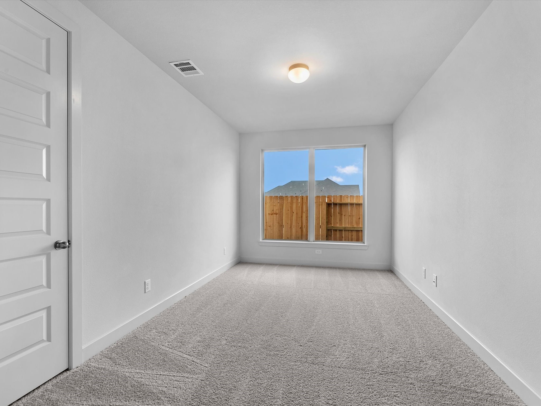 710 Walnut Br Drive Rosenberg, TX 77471 - Photo 10 of 25 a view of an empty room with a window