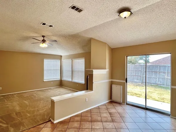 a view of an empty room with window