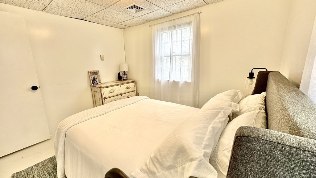 294 Killdeer Road Webster, MA 01570 - Photo 28 of 42 a bedroom with a bed and a window