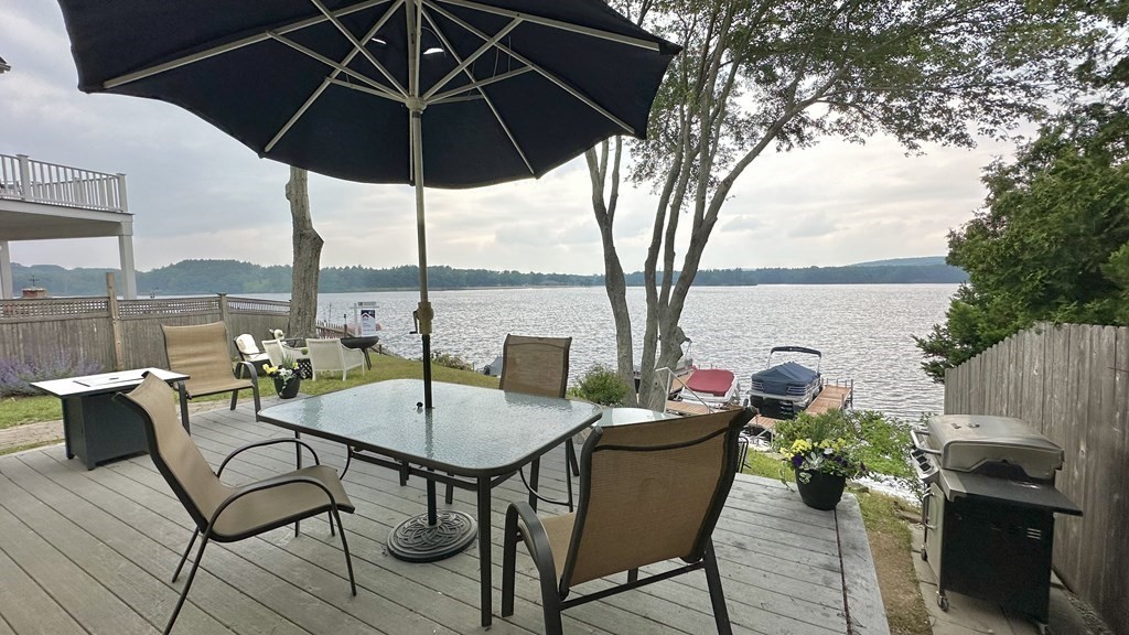 294 Killdeer Road Webster, MA 01570 - Photo 36 of 42 a view of a terrace with furniture and stove
