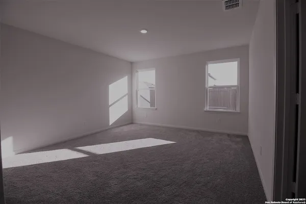 an empty room with windows