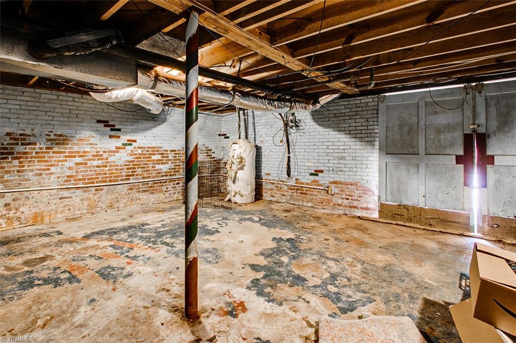183 Dublin Road Asheboro, NC 27203 - Photo 28 of 29 Unfinished Basement with Double Sliding Barn Doors