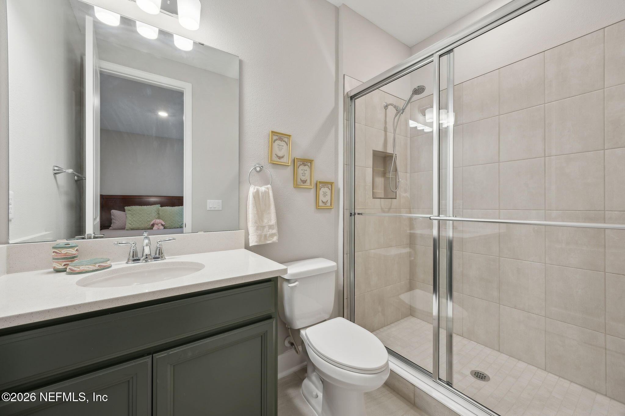 92503 Shipton Lane Fernandina Beach, FL 32034 - Photo 17 of 32 a bathroom with a sink toilet and shower