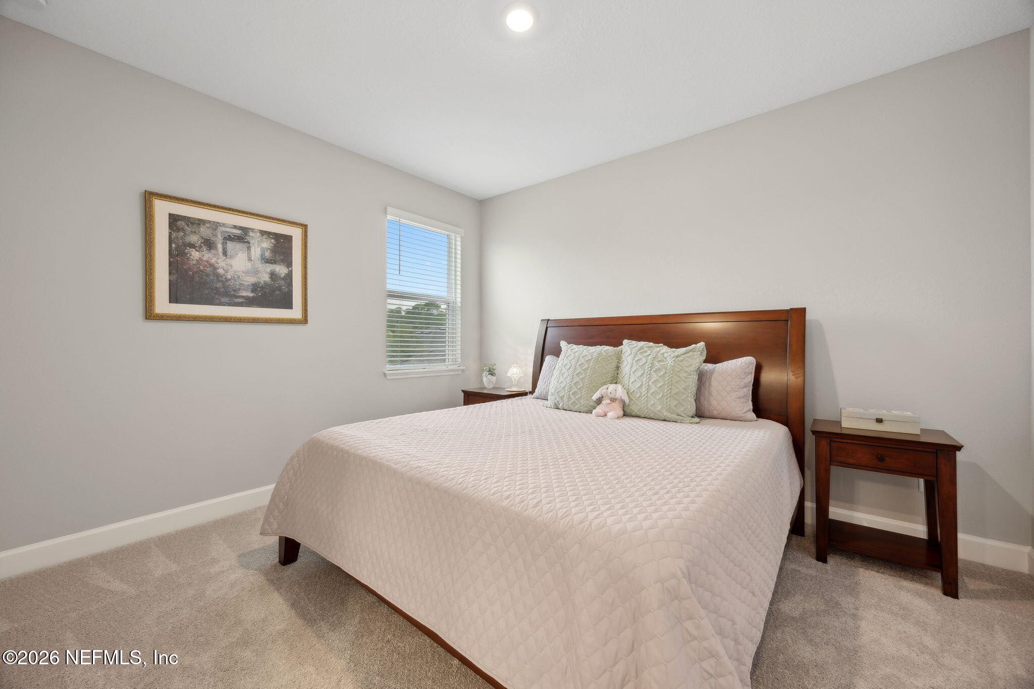 92503 Shipton Lane Fernandina Beach, FL 32034 - Photo 23 of 32 a bedroom with a bed and a night stand