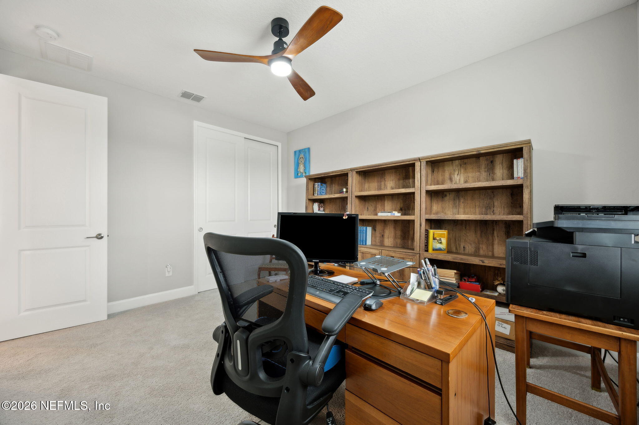 92503 Shipton Lane Fernandina Beach, FL 32034 - Photo 25 of 32 a room with furniture and a window