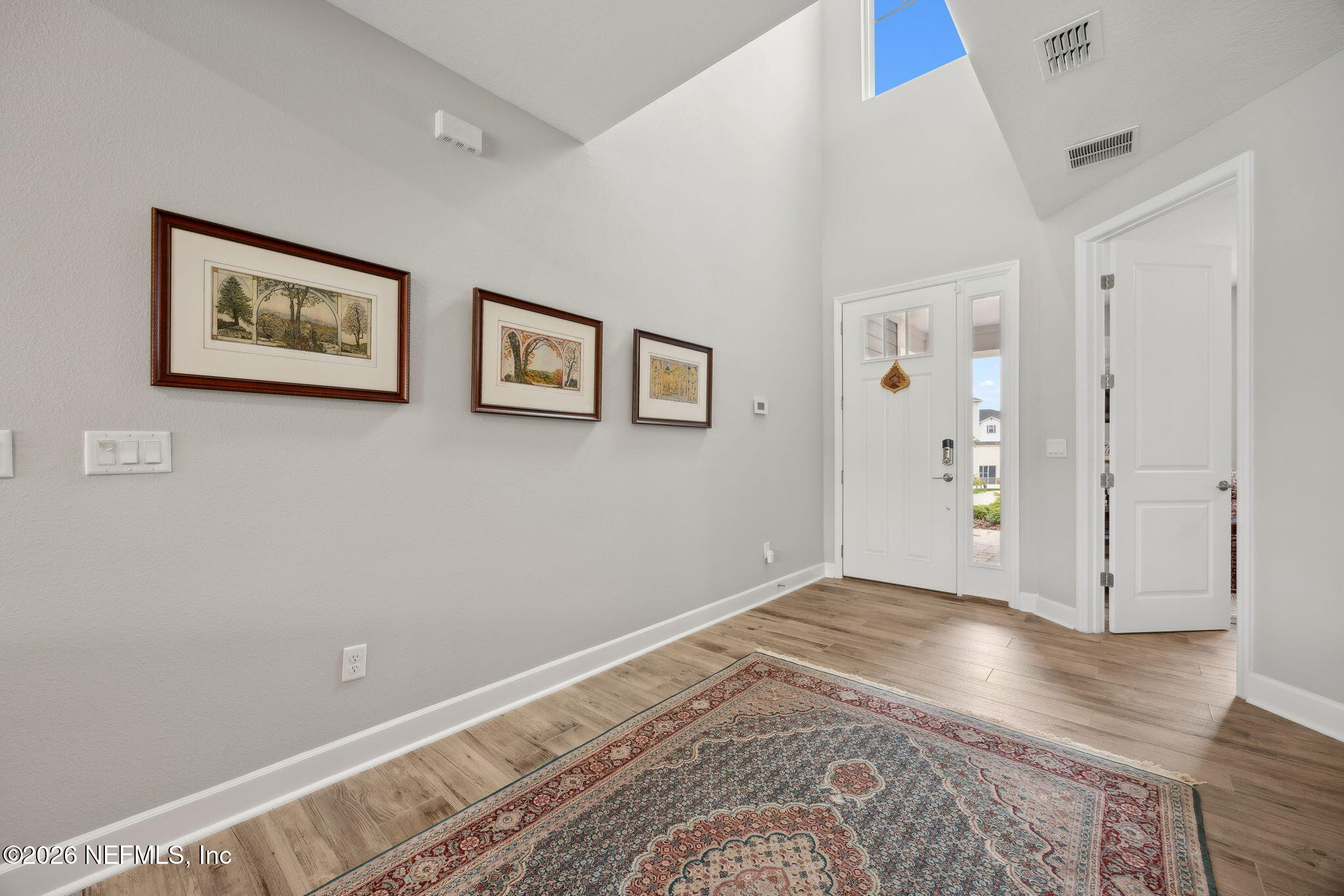 92503 Shipton Lane Fernandina Beach, FL 32034 - Photo 4 of 32 a view of a big room with wooden floor and closet