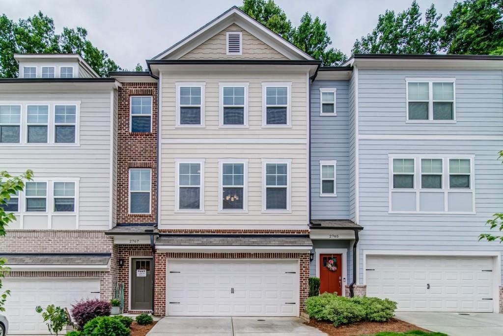 2767 White Oak Lane Decatur, GA 30032 - Photo 1 of 1 a front view of a house with a yard and garage