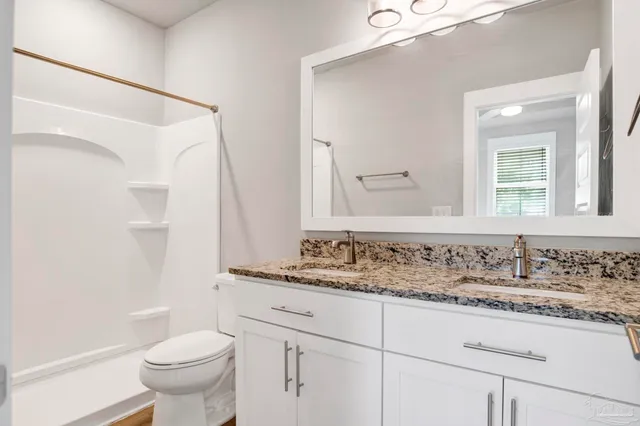 a bathroom with a sink and a toilet