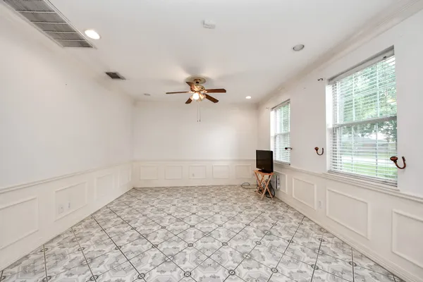 a view of a livingroom with a kitchen