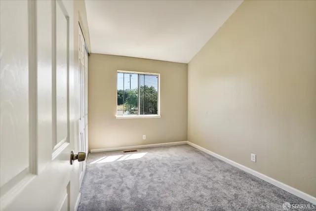 a bathroom with a granite countertop sink a toilet and bathtub