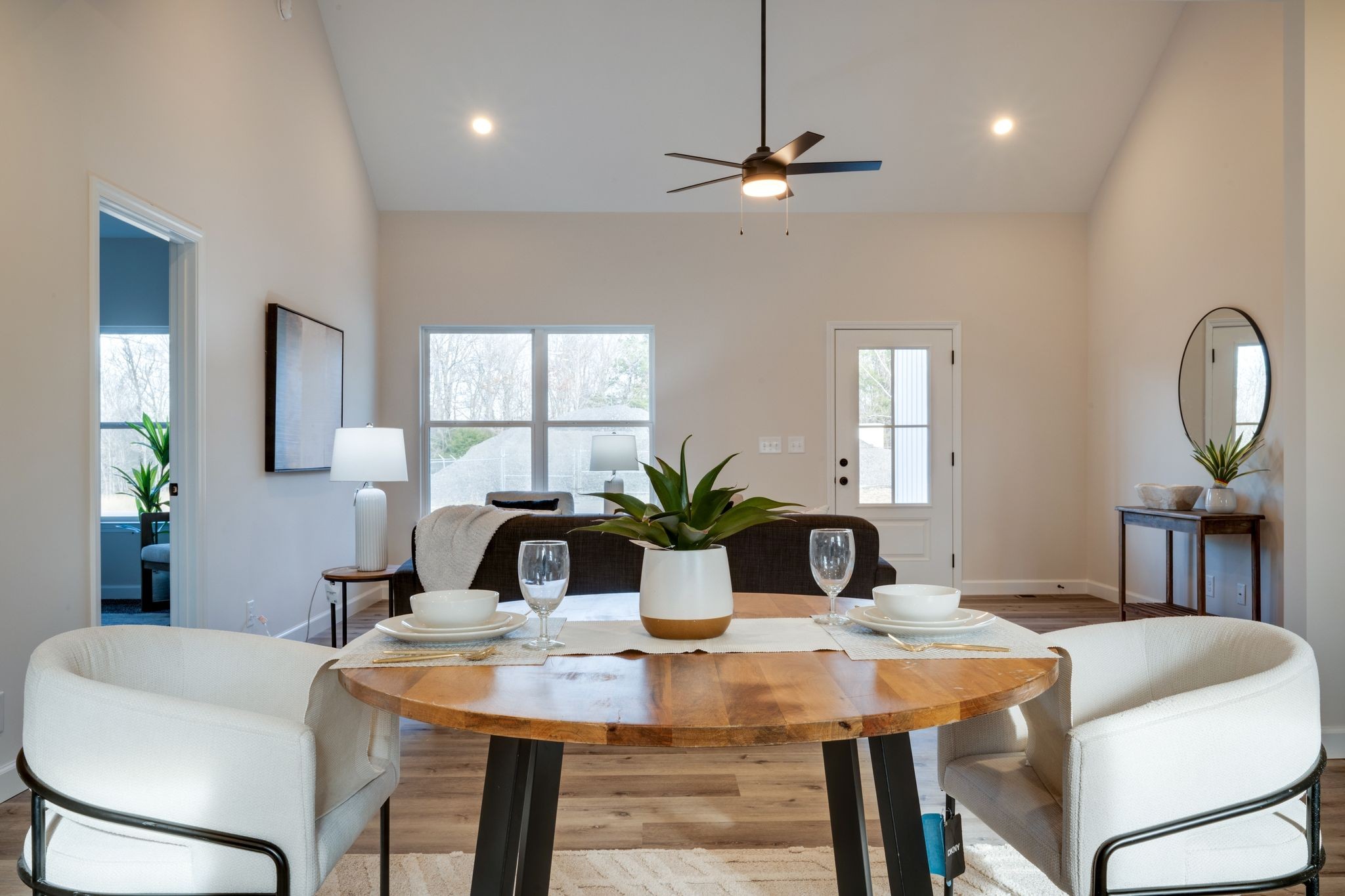 3033 Bowker Road Charlotte, TN 37036 - Photo 14 of 30 a view of a dining room with furniture and a large mirror