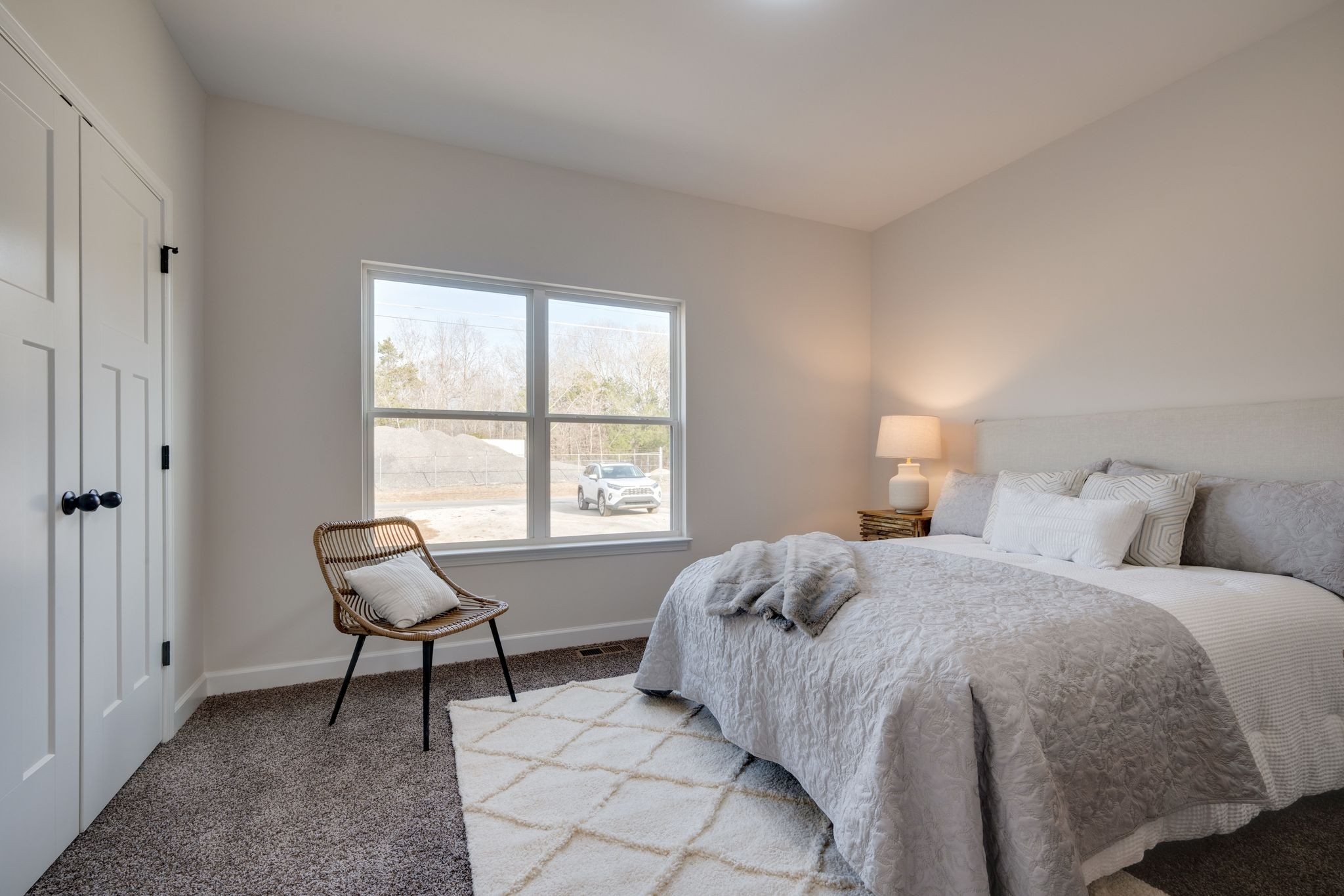 3033 Bowker Road Charlotte, TN 37036 - Photo 20 of 30 a bedroom with a bed and a window