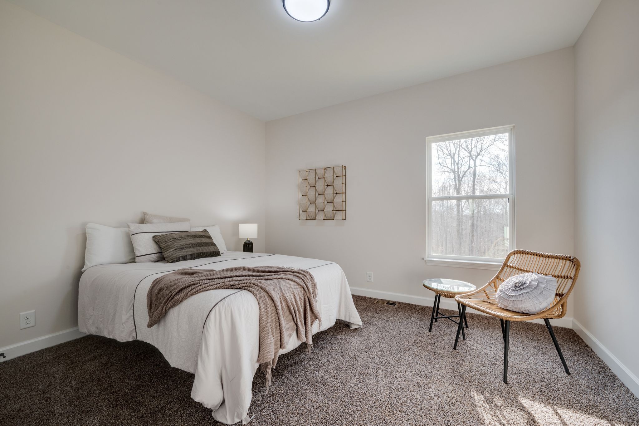 3033 Bowker Road Charlotte, TN 37036 - Photo 22 of 30 a bedroom with a bed and a window