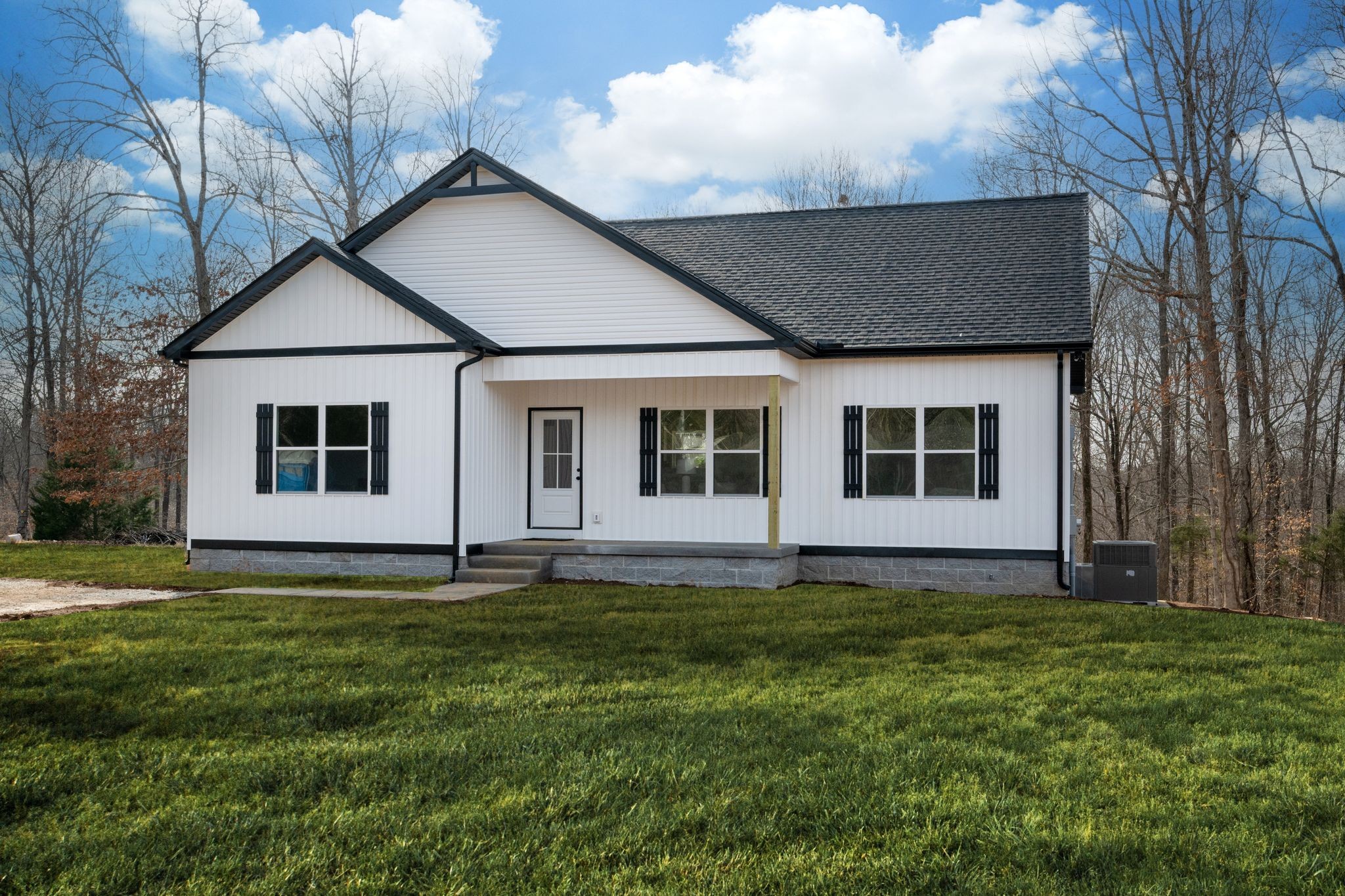 3033 Bowker Road Charlotte, TN 37036 - Photo 26 of 30 a view of a house with a yard