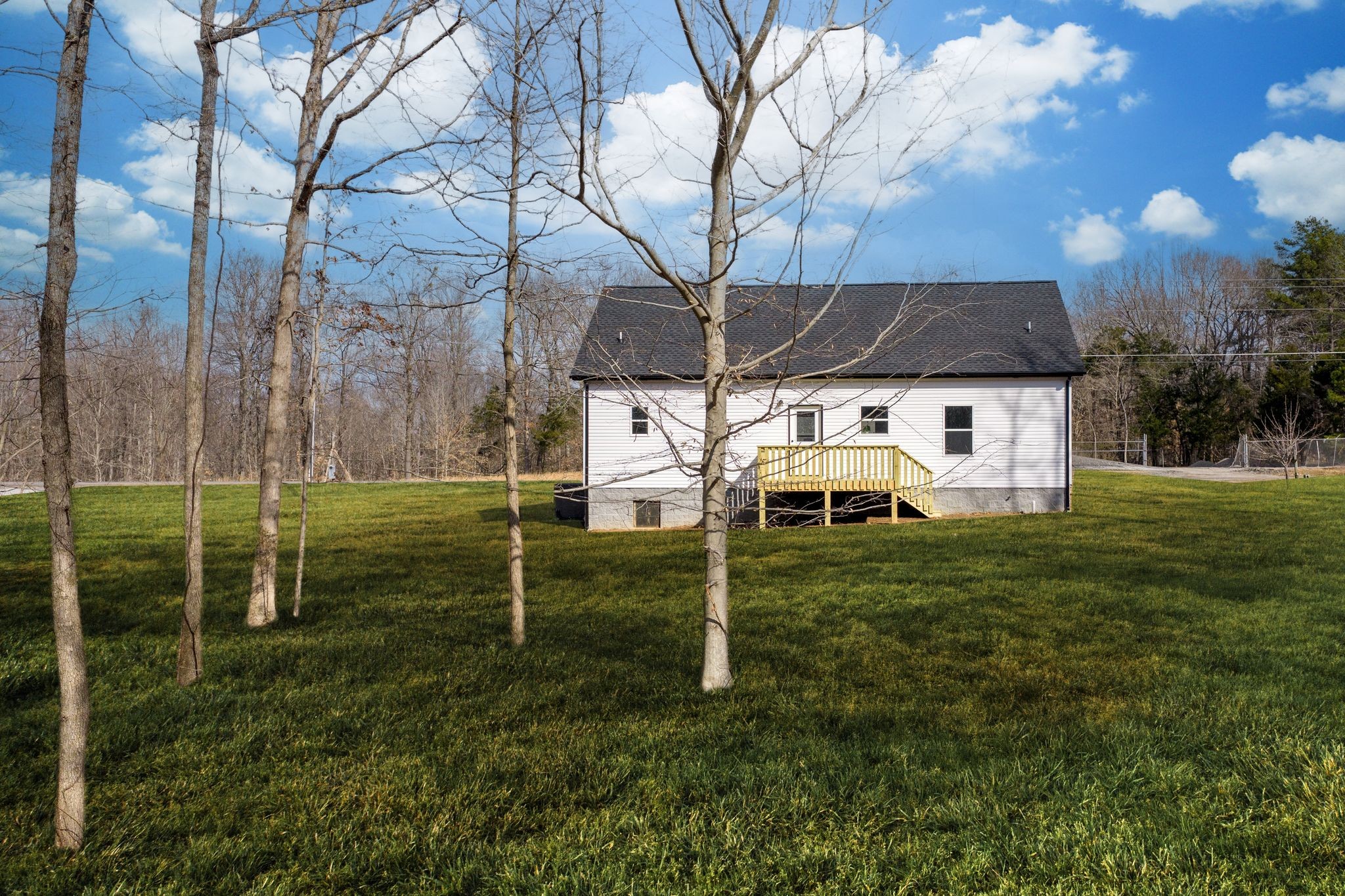 3033 Bowker Road Charlotte, TN 37036 - Photo 28 of 30 a view of a house with backyard