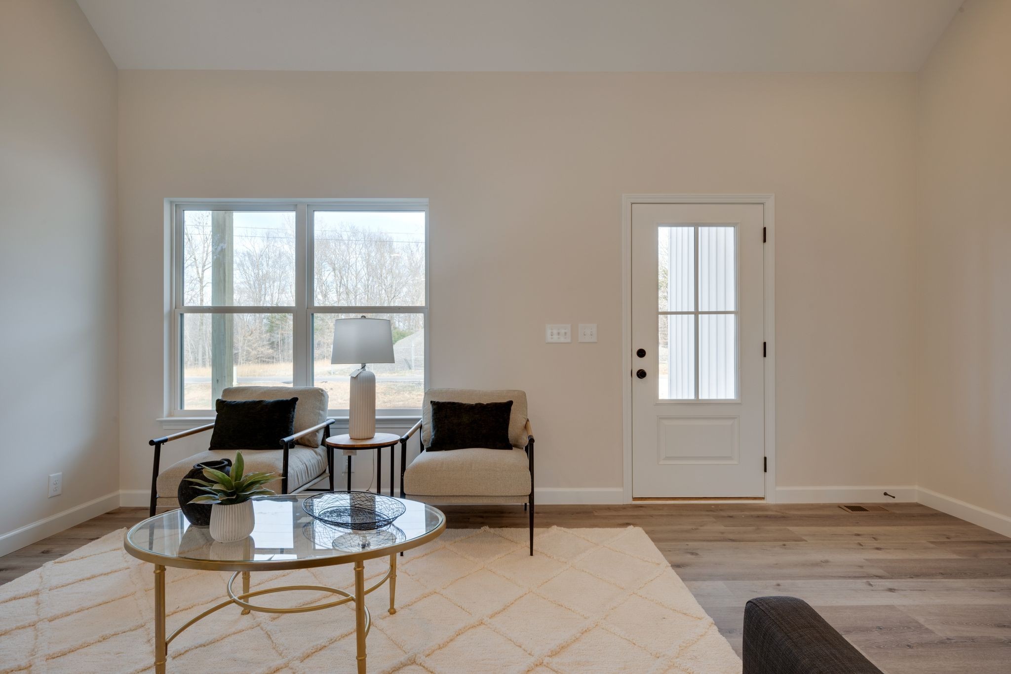 3033 Bowker Road Charlotte, TN 37036 - Photo 7 of 30 a living room with furniture and a window