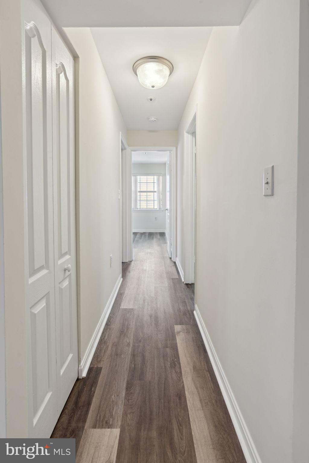 8381 Montgomery Run Road, Unit E Ellicott City, MD 21043 - Photo 15 of 31 Hallway to bedrooms