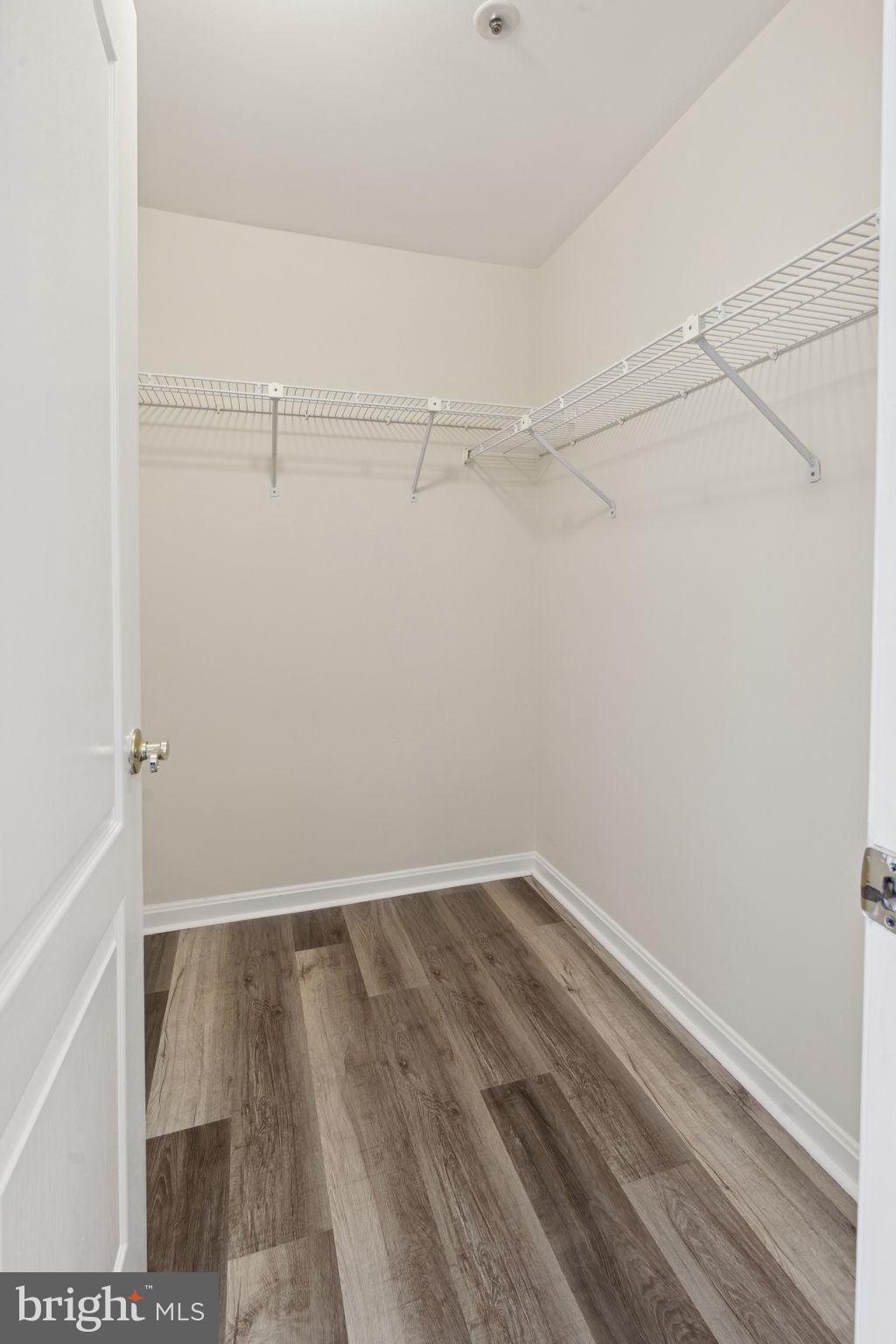 8381 Montgomery Run Road, Unit E Ellicott City, MD 21043 - Photo 23 of 31 Primary bedroom walk-in closet