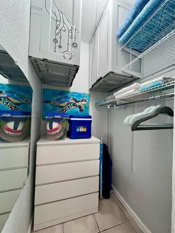 a view of storage and utility room