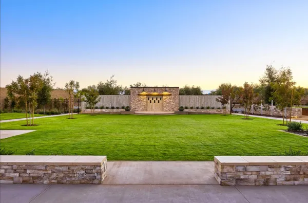 a outdoor living space with patio furniture and garden view
