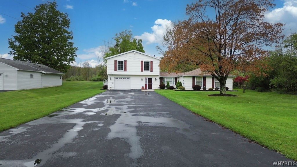 1242 Church Road Evans, NY 14047 - Photo 1 of 50 1.7 Acre Split Level with 4 Beds/1.5 Baths