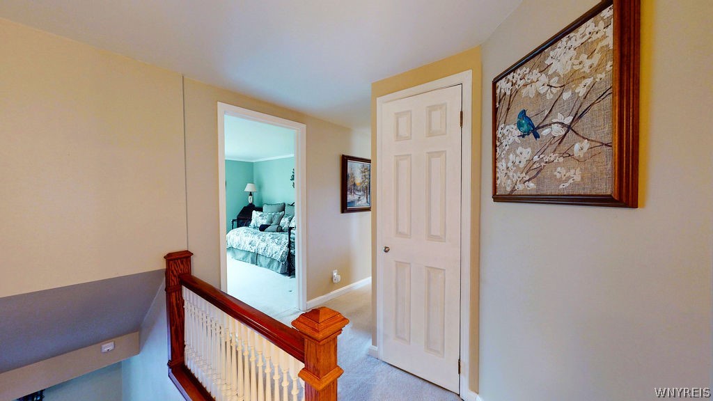 1242 Church Road Evans, NY 14047 - Photo 26 of 50 Upper Hallway with attic access