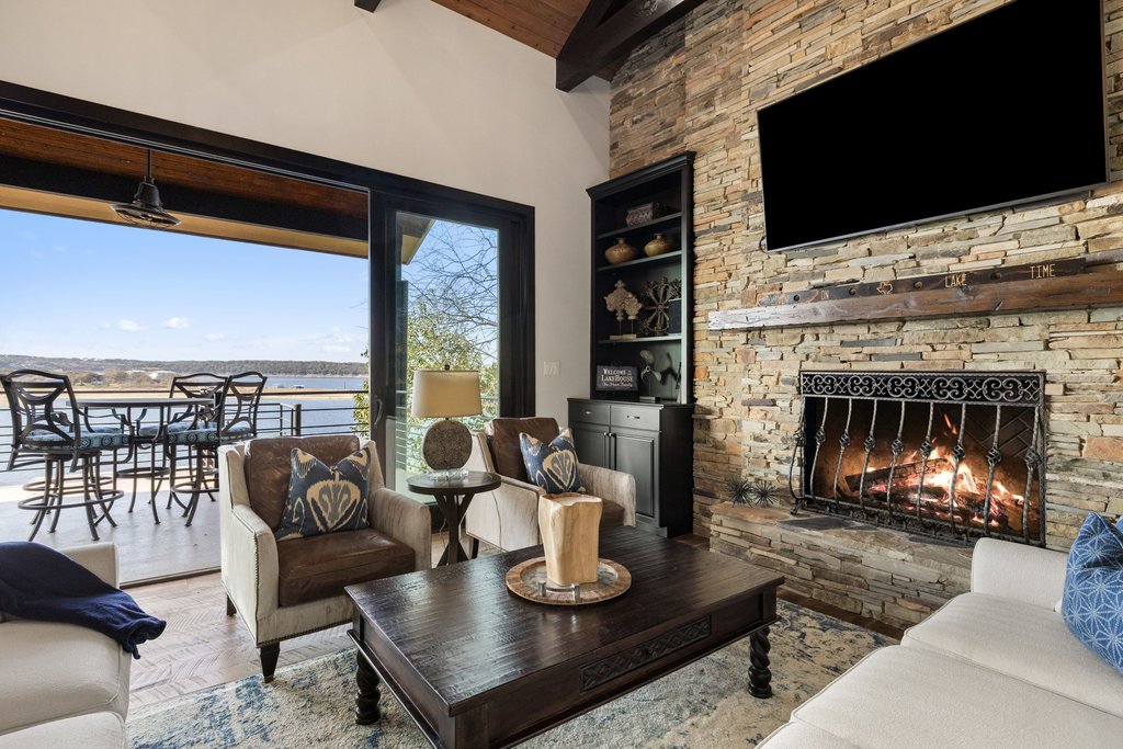 1606 Buffalo Gap Road Austin, TX 78734 - Photo 19 of 40 a living room with furniture and a fireplace