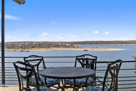 a view of a terrace with furniture and stove